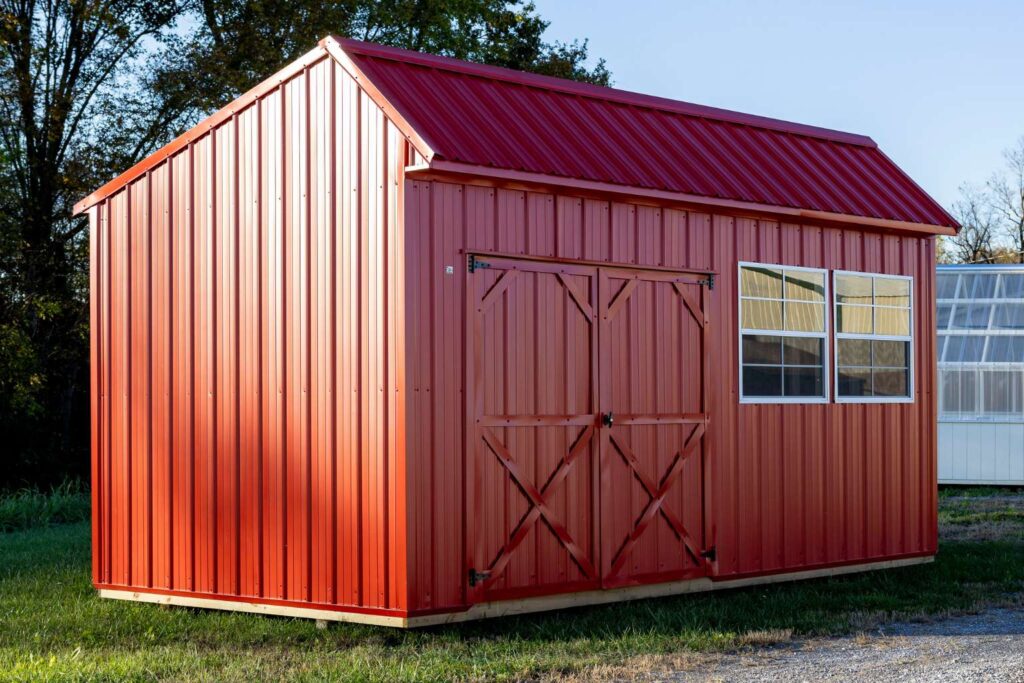 Red metal cottage shed for backyard at RampUp Storage in Troy