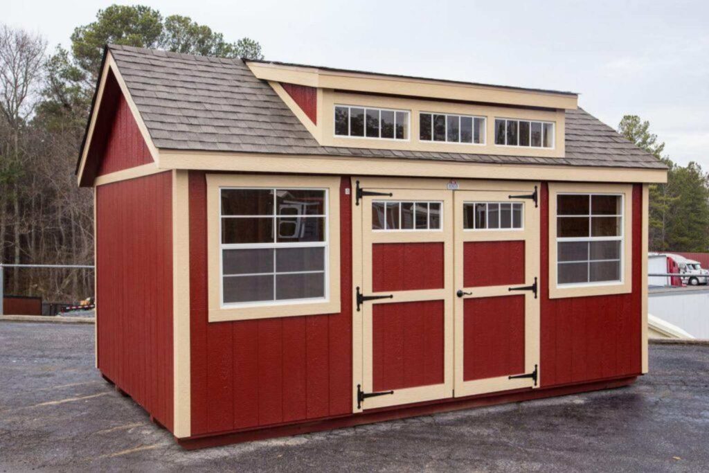 Red garden shed with light trim for sale at RampUp Storage
