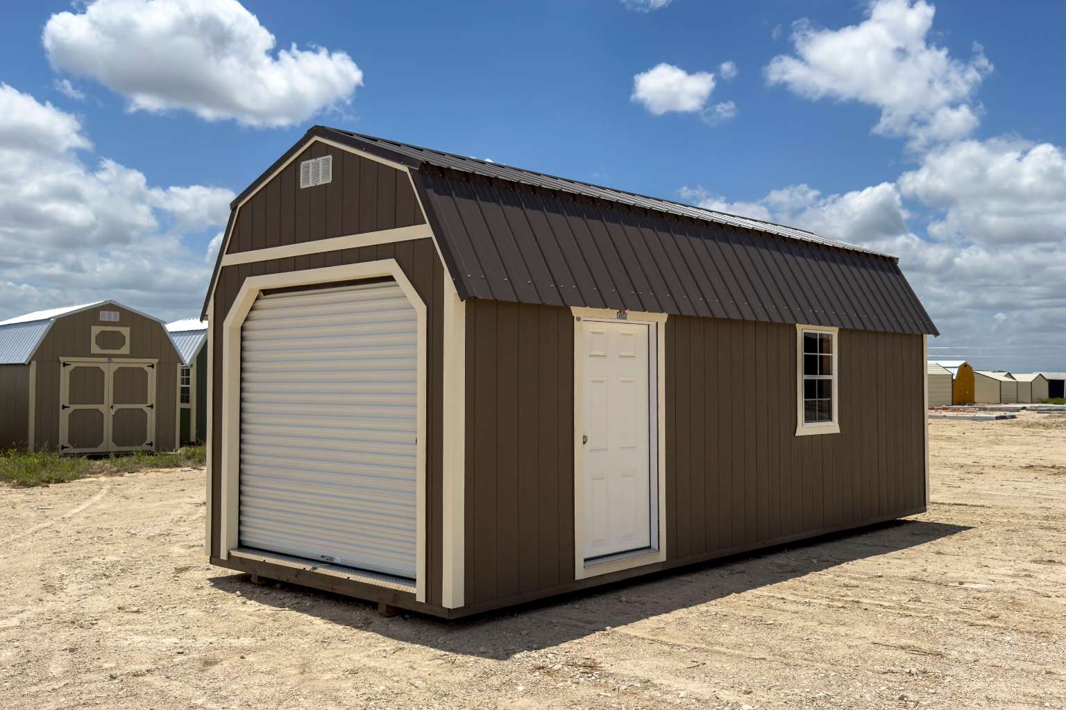 Brown lofted garage with roll up door in Texas