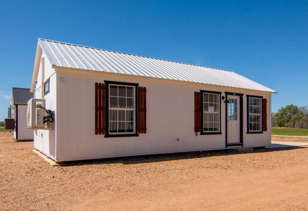 White 16x32 cabin for sale at RampUp Storage in Troy