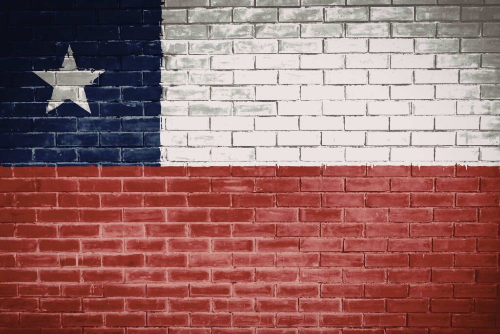 Flag of Texas on a brick wall